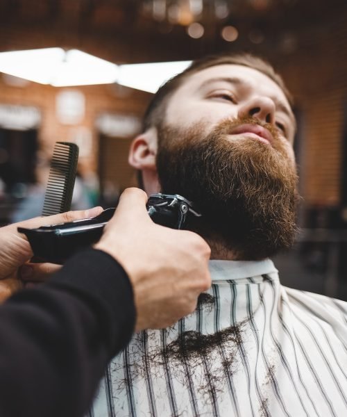 barber-cuts-beard-to-a-brutal-guy.jpg